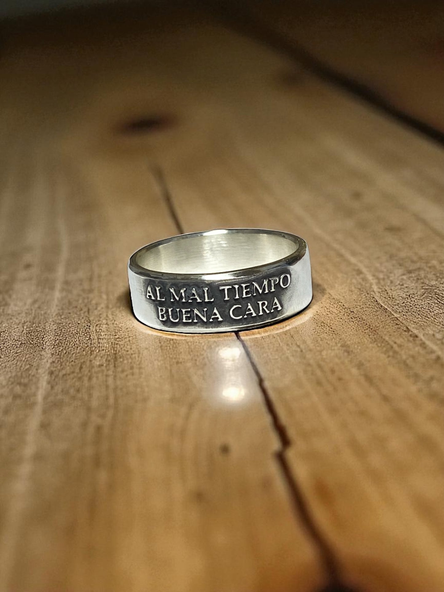 Sterling Silver Al Mal Tiempo, Buena Cara Ring – Handmade Spanish Quote Band for Men & Women | Backwoods Casting