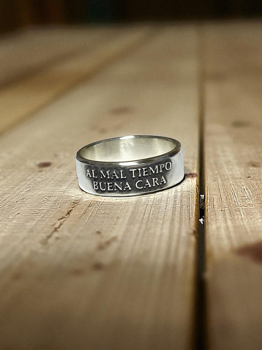 Sterling Silver Al Mal Tiempo, Buena Cara Ring – Handmade Spanish Quote Band for Men & Women | Backwoods Casting