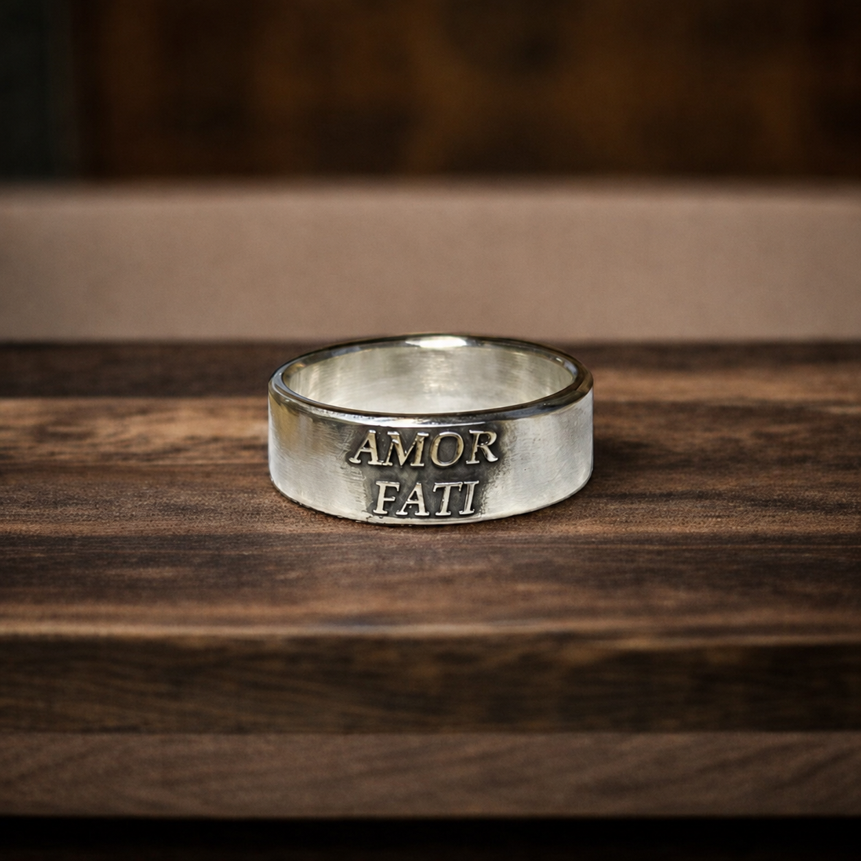 Amor Fati sterling silver band with raised lettering
