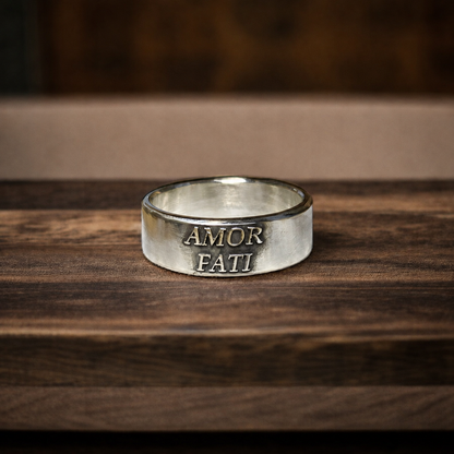 Amor Fati sterling silver band with raised lettering