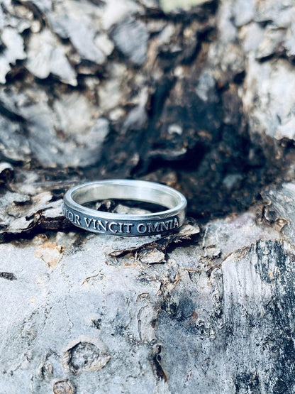 Amor Vincit Omnia ring interior and raised lettering