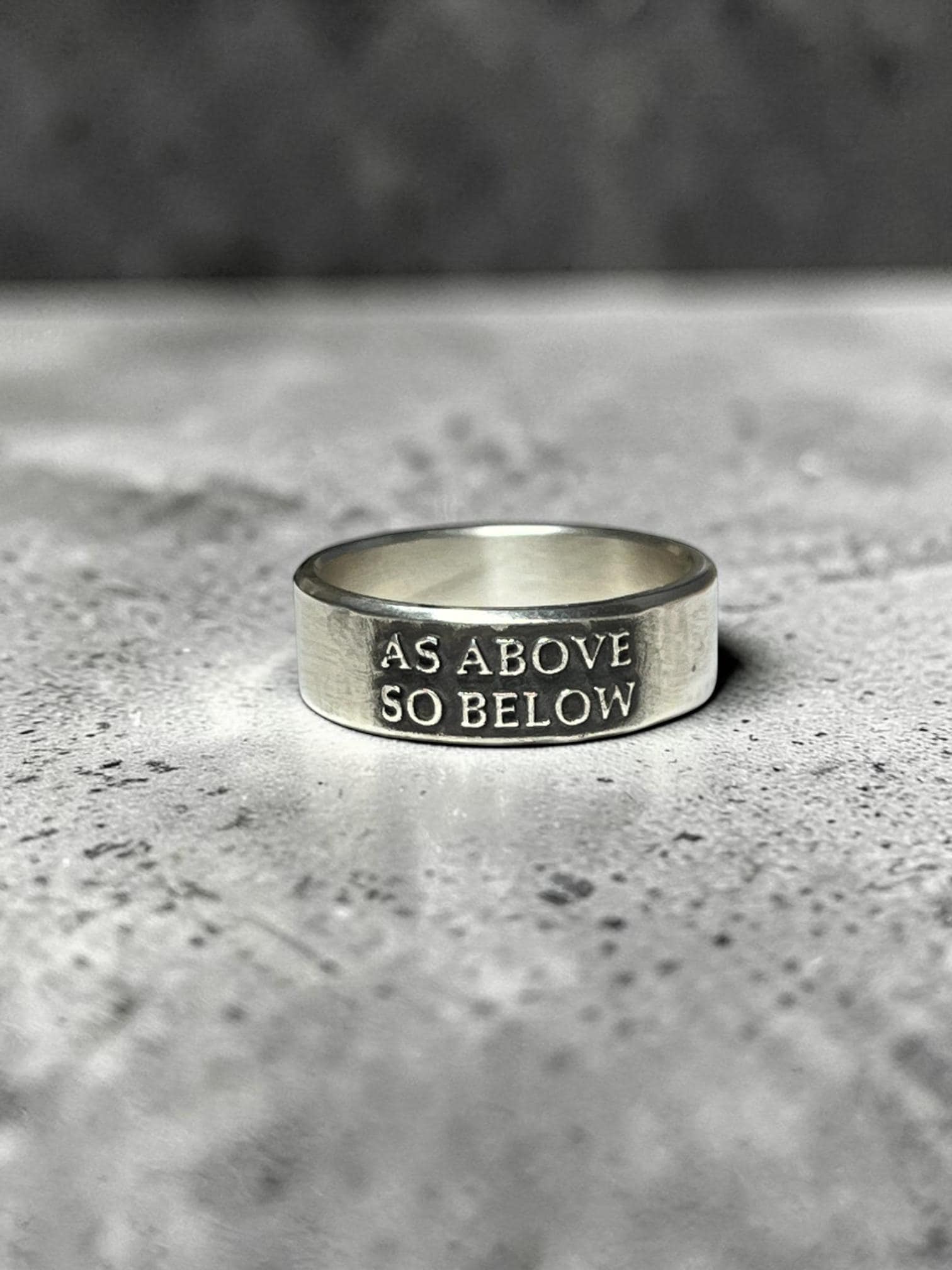 As Above So Below wide sterling silver ring with raised lettering