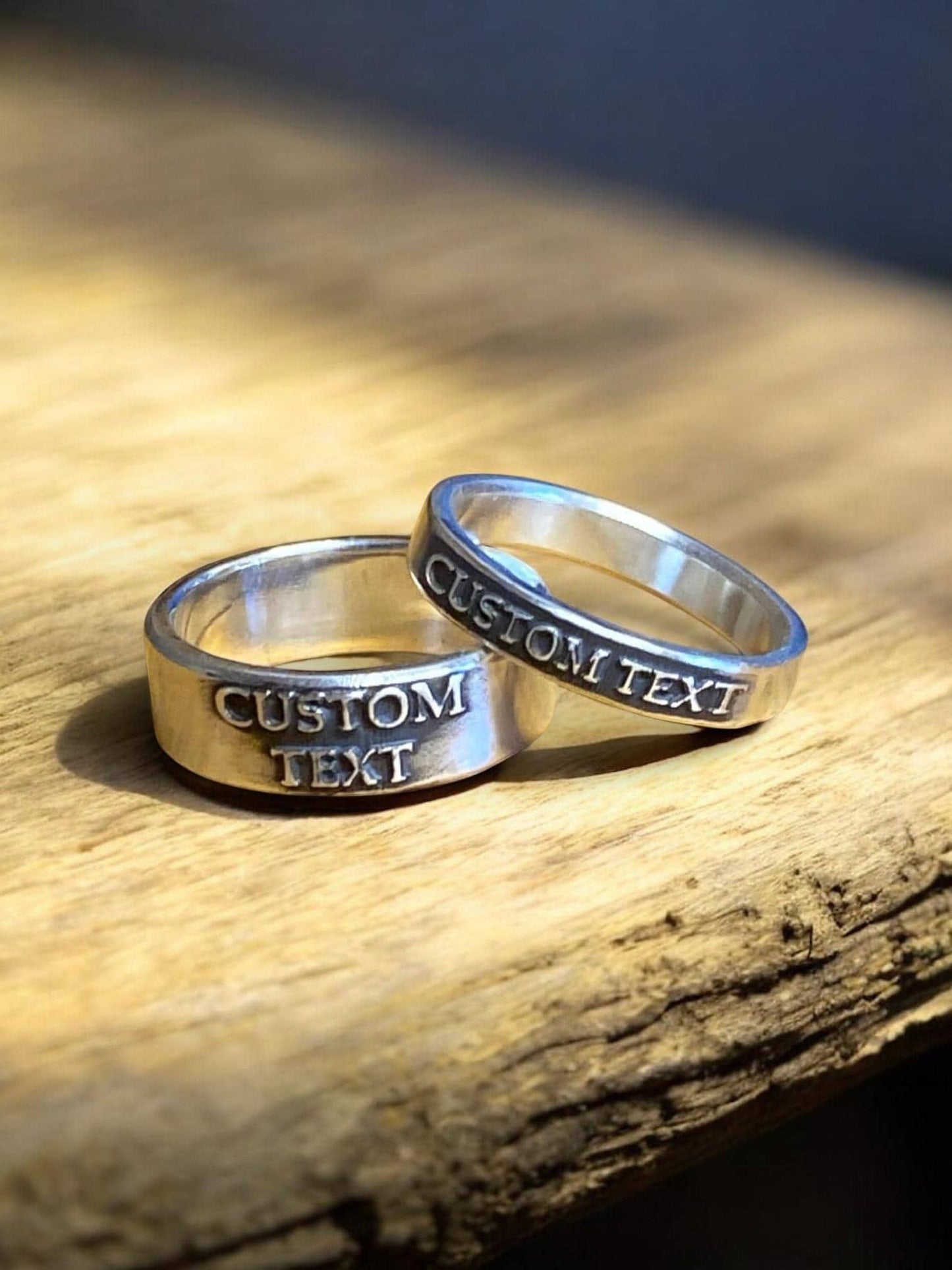 Custom sterling silver couples ring set with one thin band and one wide band