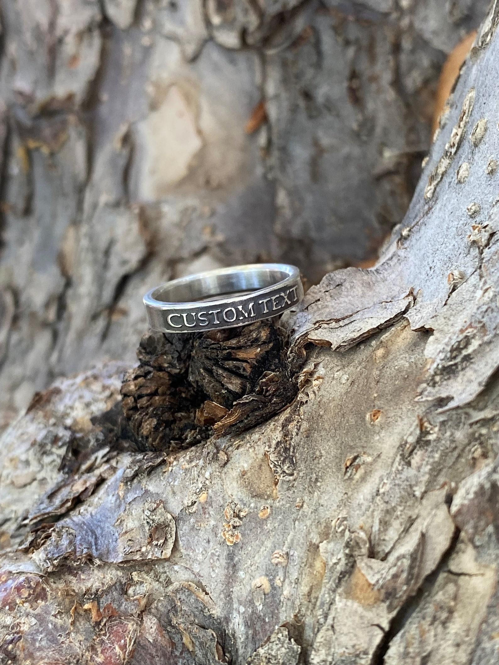 Thin personalized sterling silver ring with custom raised text