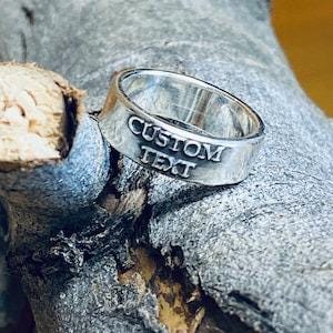 Rustic custom sterling silver ring with antiqued lettering