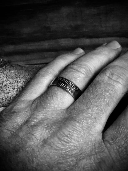 Memento Mori sterling silver ring worn on hand
