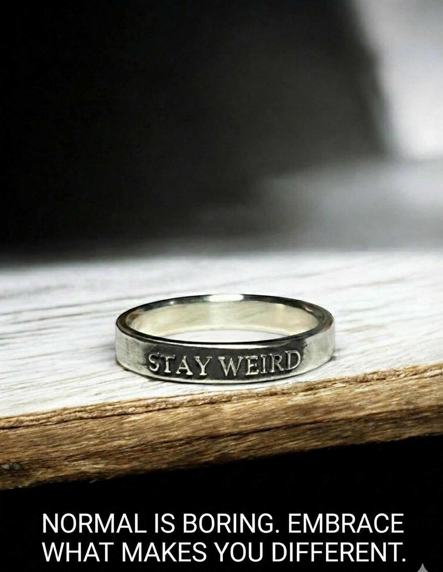 Stay Weird sterling silver ring with raised lettering
