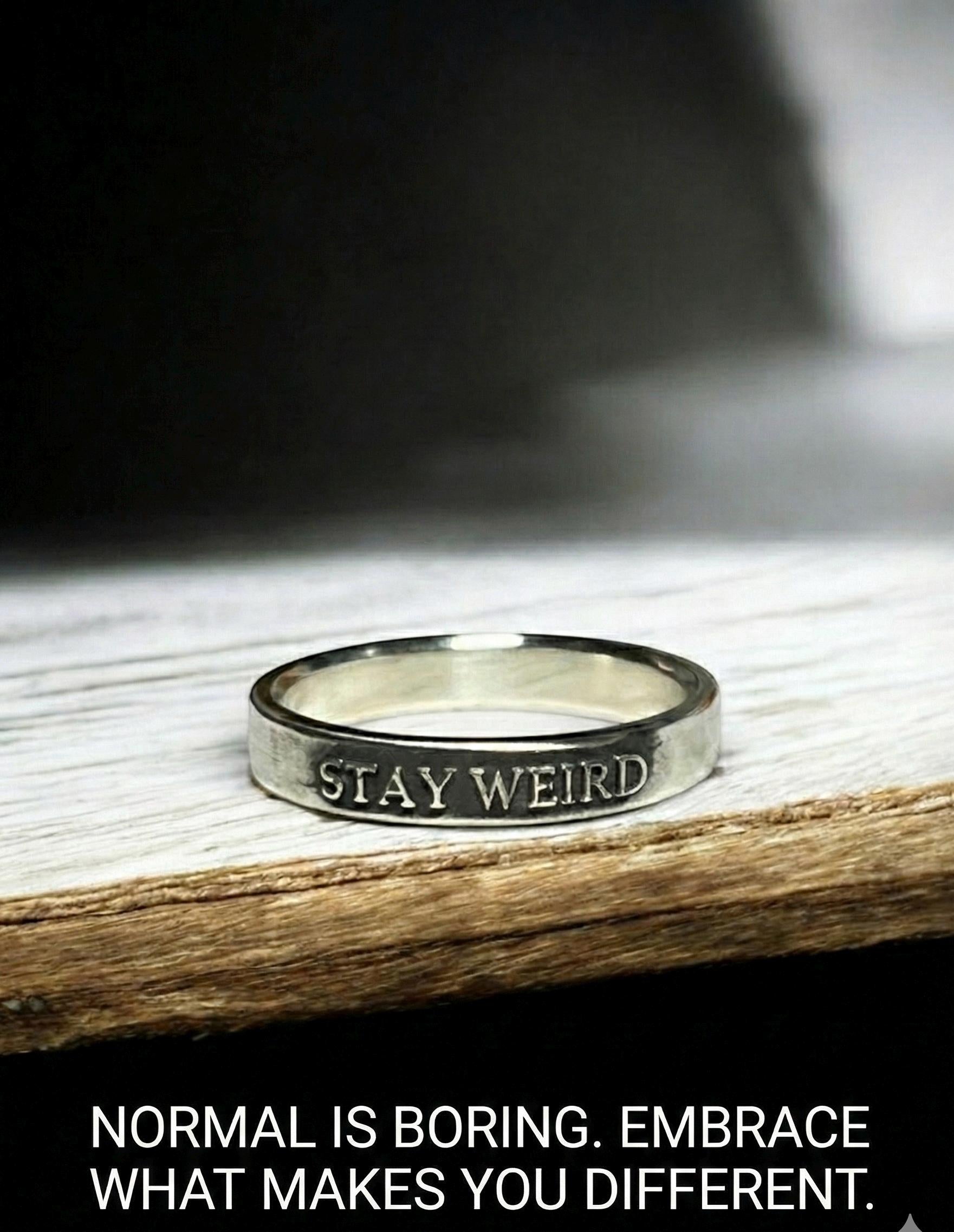 Stay Weird sterling silver ring with raised lettering